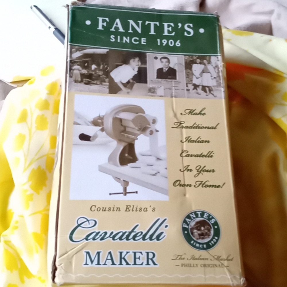 Cavatelli maker, never been used, box in bad shape, and Russian Ravioli maker,